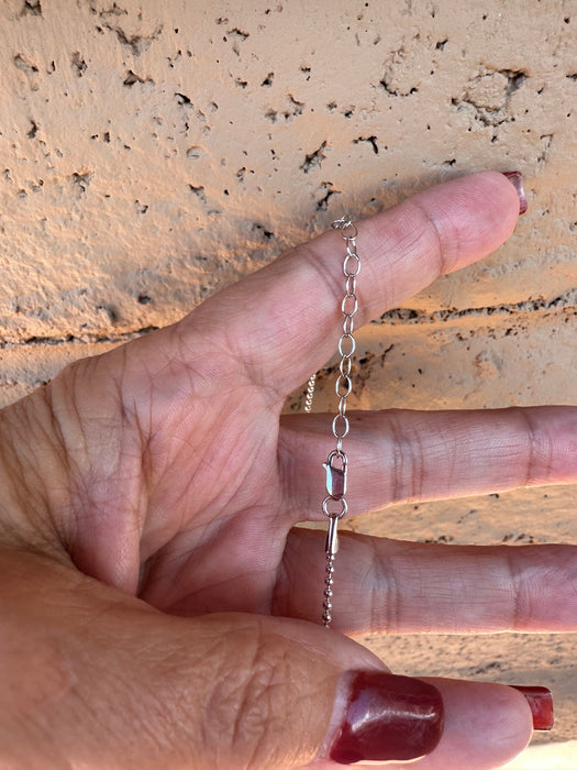 Introducing the "Radiant Cascades Lariat Sterling Silver and Diamond Necklace."