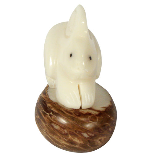<center>Rascal Rabbit Tagua Pet Figurine </br>Crafted by Artisans in Ecuador </br>Measures 2” high x 1-1/4” wide x 1-3/4” deep</center>