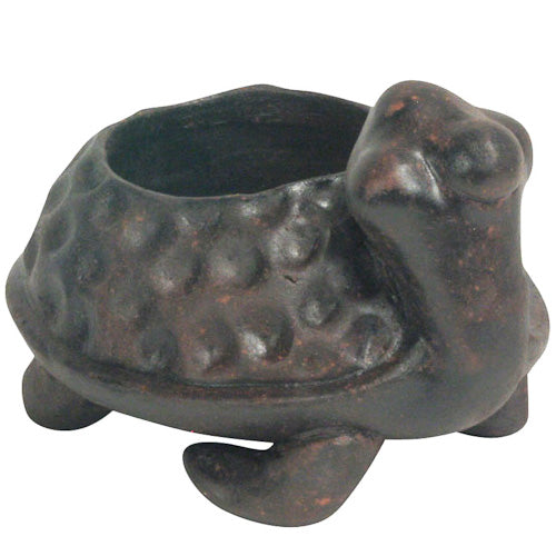 <center> Turtle Clay Planter </br> Crafted by Artisans in El Salvador </br> Exterior measures 4 1/2" high x 5 3/4" wide x 7" diameter </center>