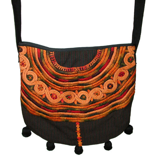 <center>Large Black Joyabaj Shoulder Purse with Ball Fringe <br> Made from a Recycled-Huipil in Guatemala<br>Measures: 12-1/2" high x 12-1/2" wide and 23-1/2" drop</center>