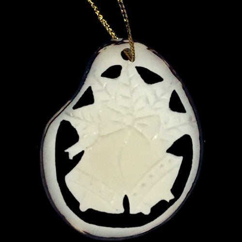 <center>Tagua Nut Christmas Bells Ornament Slice</br>from Ecuador </br>Average Measurement - 1 3\8" high x 1 5/8" wide x 1/8" thick</center>
