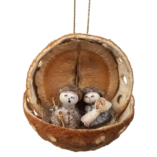 <center>  This Nativity Ornament is made from an Orange Peel.<br>Eucalyptus Pods are used for the bodies and white beans the heads.<br>It is produced by Artisans in Ecuador </center>