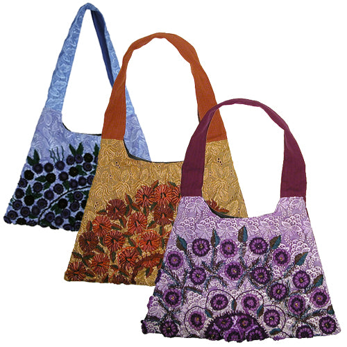 <center> Rococo Handbag made in Guatemala - Trapezoid </br>Available in Brown, Blue and Purple Tones</br> Measures 17" wide x 12" high</center>