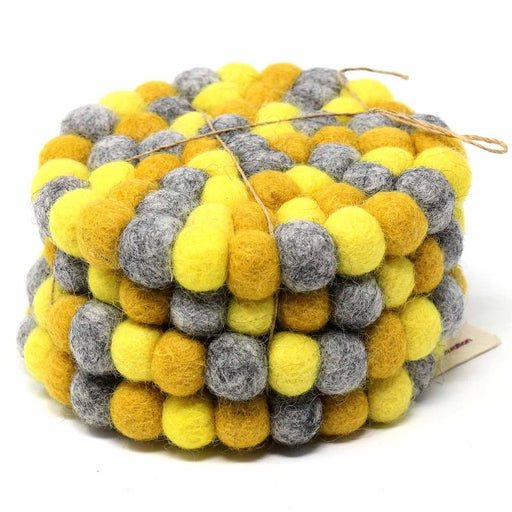 Hand Crafted Felt Ball Coasters from Nepal: 4-pack, Chakra Yellows - Global Groove (T) - Culture Kraze Marketplace.com
