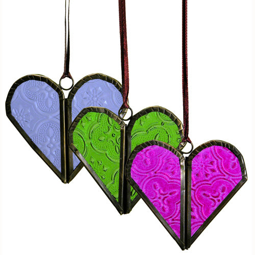 <center>Hinged Metal and Glass Heart Christmas Ornaments</br>Available in Pink, Green, and Blue</br>Measures: 3" high x 3" wide</center>