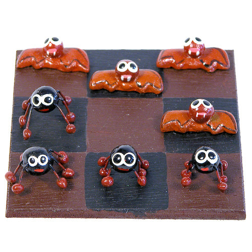 <center>Spiders vs. Bats Tic-Tac-Toe Games crafted by Artisans in Guatemala </br> Each Board  Measures 3-1/2” x 3-1/2”, with 1/4-3/4” game pieces</center> 