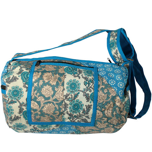 <center>Blue Tone Patchwork Round Bag </br>Crafted by Artisans in India </br>Measures 12-1/2” long x 8-1/2” diameter</center>