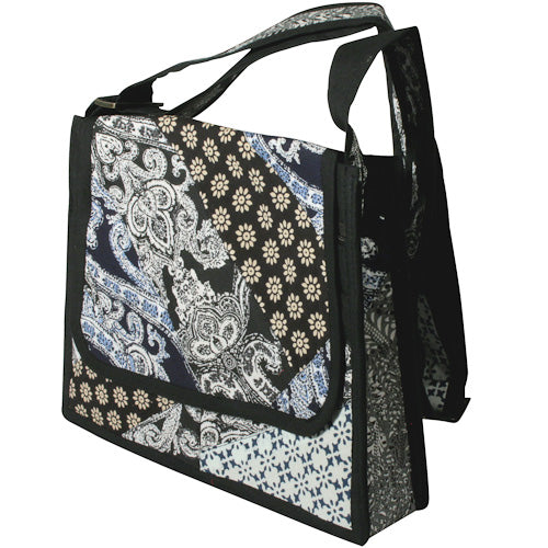 <center>Black and White Patchwork Shoulder Bag </br>Crafted by Artisans in India </br>Measures 11” high x 12” wide x 2-1/2” deep at base</center>