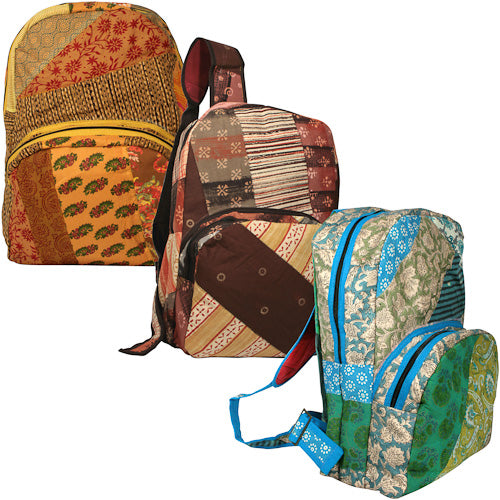 <center>Recycled Fabric Patchwork Backpacks </br>Crafted by Artisans in India </br>Measure 17” high x 12-1/2” wide x 6-1/2” deep</center>