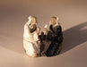 Ceramic Figurine Two Men Sitting On A Bench - 2.5" Color: White & Blue - Culture Kraze Marketplace.com