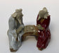 Ceramic Figurine Two Men Sitting On A Bench Playing Chess - 2.25" Color: Red & White - Culture Kraze Marketplace.com