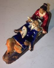 Ceramic Figurine Man & Woman Relaxing On A Bench - Culture Kraze Marketplace.com