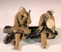 Miniature Ceramic Figurine  Two Men Sitting on Bench Playing Musical Instrument - 2.5"  Unglazed - Culture Kraze Marketplace.com