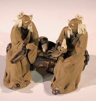 Ceramic Figurine Two Mud Men Sitting On A Bench with Musical Instrument - 2" - Culture Kraze Marketplace.com