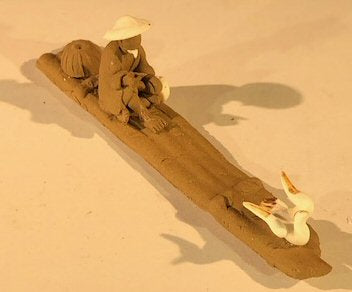 Miniature Ceramic Figurine Mud Man Riding On Raft With Ducks 1" - Culture Kraze Marketplace.com