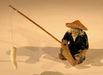 Miniature Ceramic Figurine - Glazed Fisherman  2" tall - Culture Kraze Marketplace.com