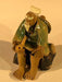 Miniature Ceramic Figurine   Man Holding a Pipe 2" - Culture Kraze Marketplace.com