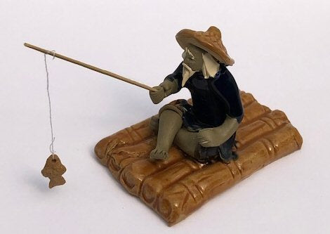 Miniature Ceramic Figurine Glazed Fisherman Sitting On Raft 2.75" - Culture Kraze Marketplace.com