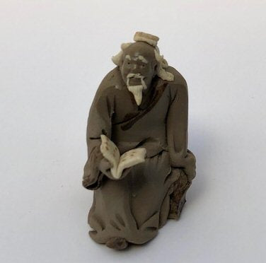 Ceramic Figurine Mud Man Reading Book - 2" - Culture Kraze Marketplace.com