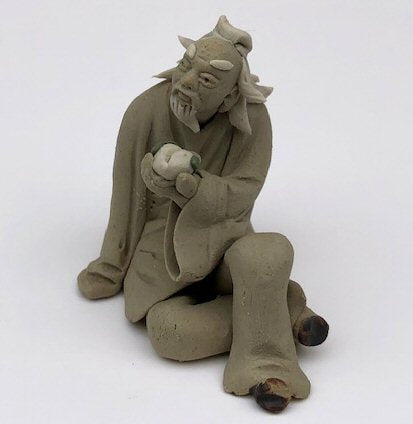 Miniature Ceramic Figurine  Mud Man Holding Fruit - 2.5" - Culture Kraze Marketplace.com