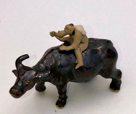 Ceramic Figure Man Ridding on Buffalo - Culture Kraze Marketplace.com