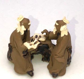 Miniature Ceramic Figurine Two Mud Men Sitting On A Bench Reading Books - 1.5" - Culture Kraze Marketplace.com