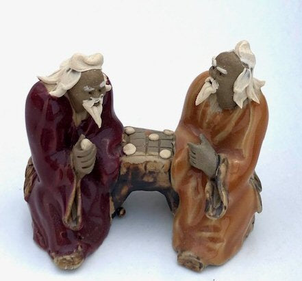 Ceramic Figurine Two Men Sitting On A Bench Playing Chess - 2" Color: Orange & Red - Culture Kraze Marketplace.com