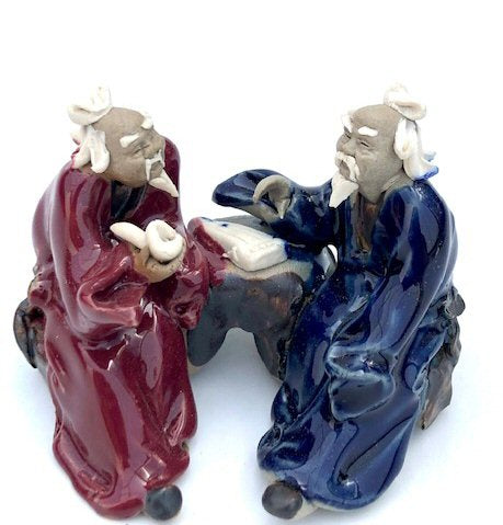 Ceramic Figurine Two Men Sitting On A Bench Playing Music 2" Color: Blue & Red - Culture Kraze Marketplace.com
