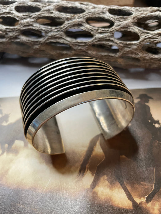 Navajo Hand Crafted Sterling Silver Cuff Bracelet By Tom Hawk